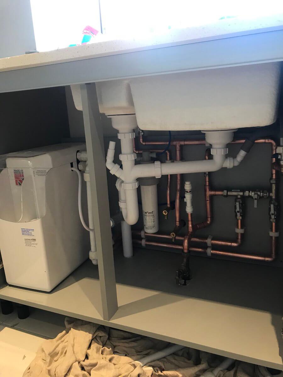 Figure 11 Installing a home desalination system.